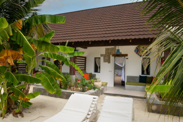 Back Pool veranda with couches at Fun Beach Hotel Zanzibar