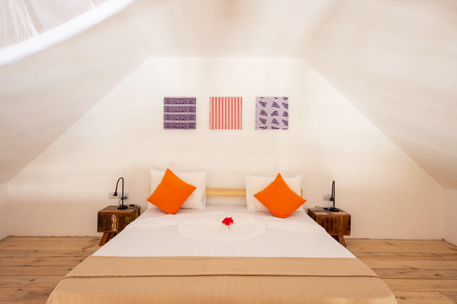 Double bed in suite room at Fun Beach Hotel Zanzibar