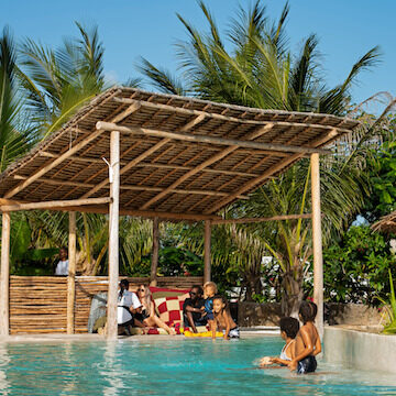 Kids playing in back pool at Fun Beach Hotel Zanzibar