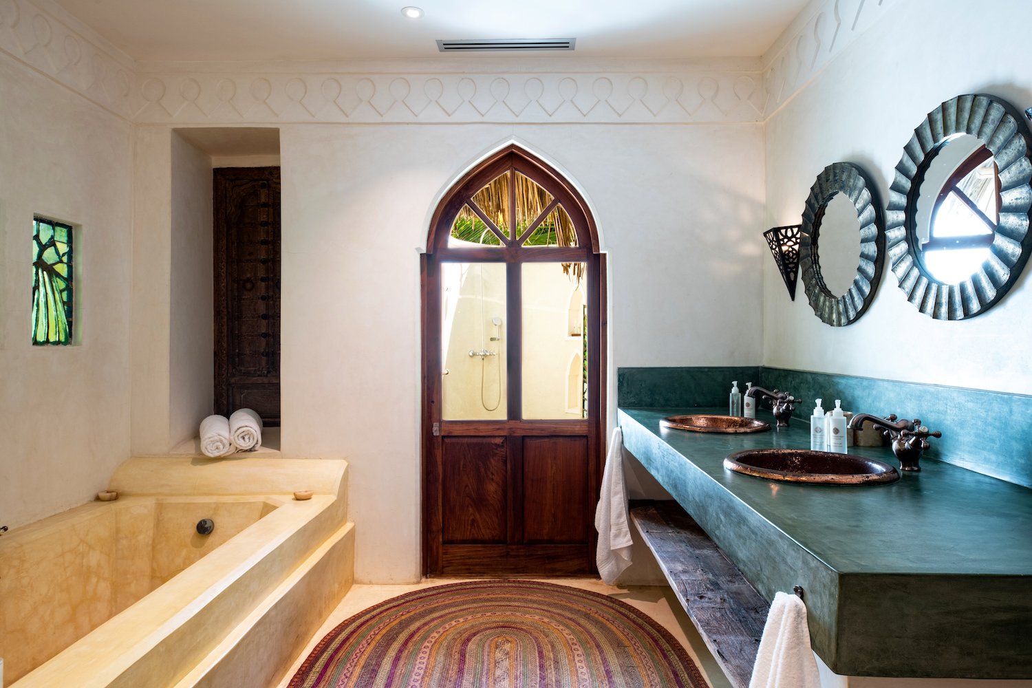 Qambani Luxury Resort Zanzibar Hotel - Sultan Villa bathroom with dual sink, bathtub and outdoor shower