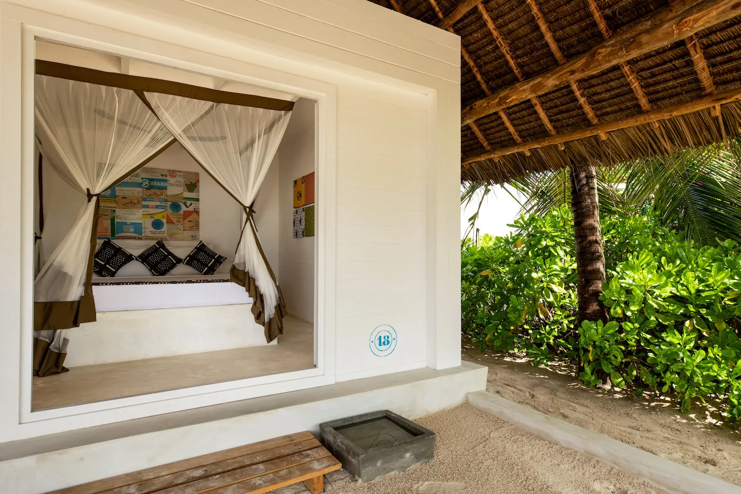 Zanzibar hotel The Loop Beach Resort veranda with access to bedroom with double bed Our Zanzibar Hotel Group
