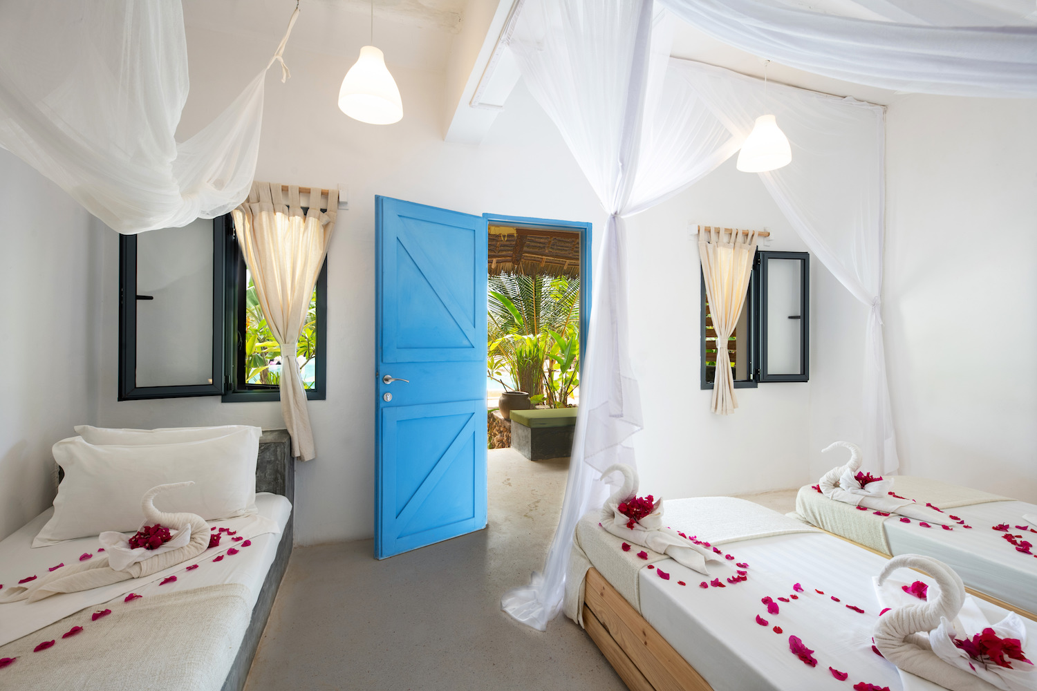 triple bed setup in Back Pool Room at Fun Beach Hotel Zanzibar
