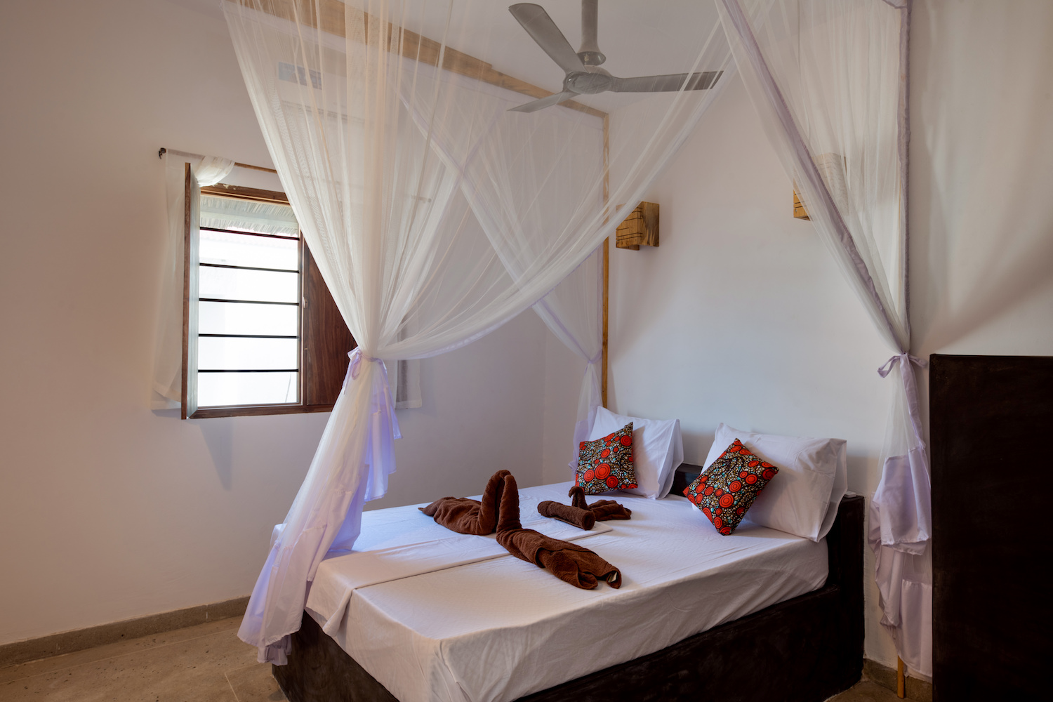 Our Zanzibar Group Nyumbani Residence double bed with mosquito net one bedroom apartment